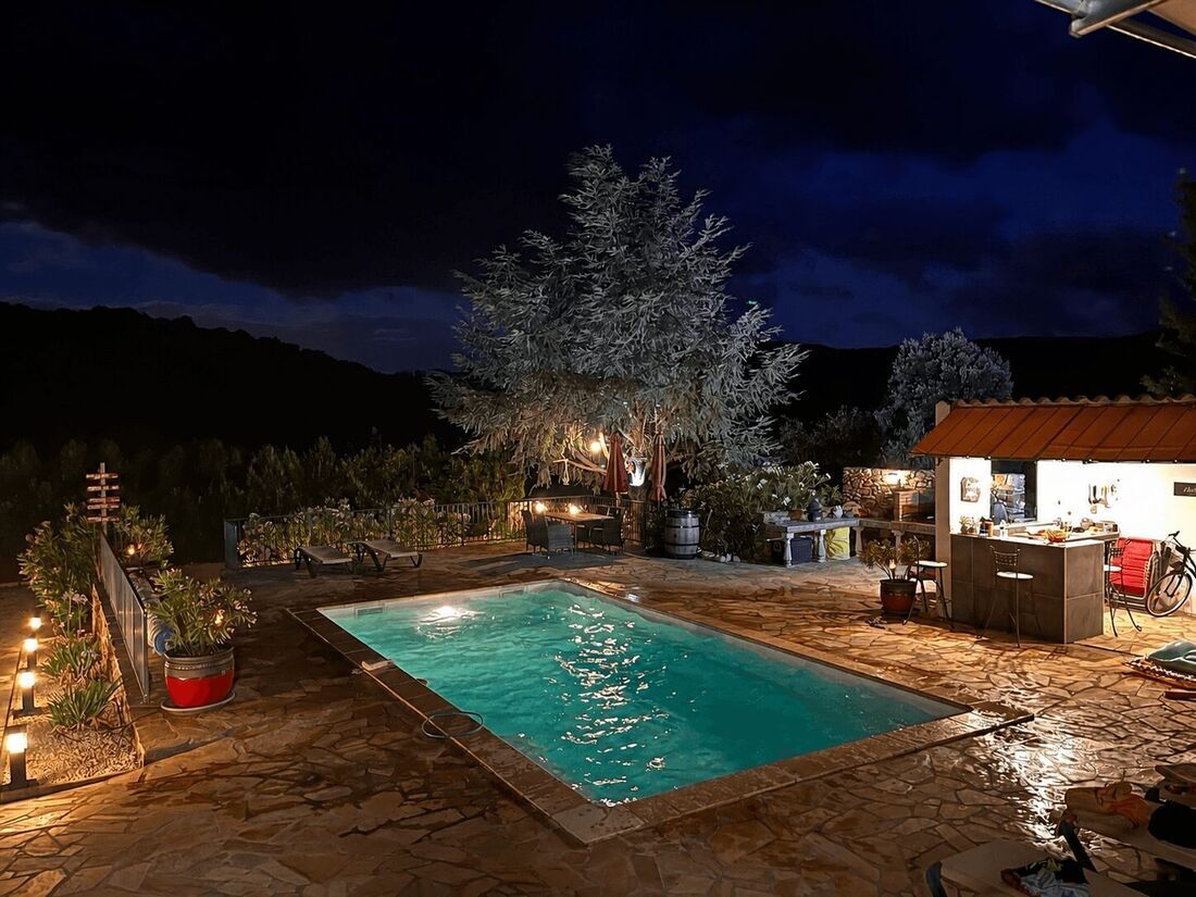 Garden terrace illuminated in the evening